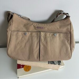 Baggalini brand women bag. Used but new looking. Middle sizes. Ten color.